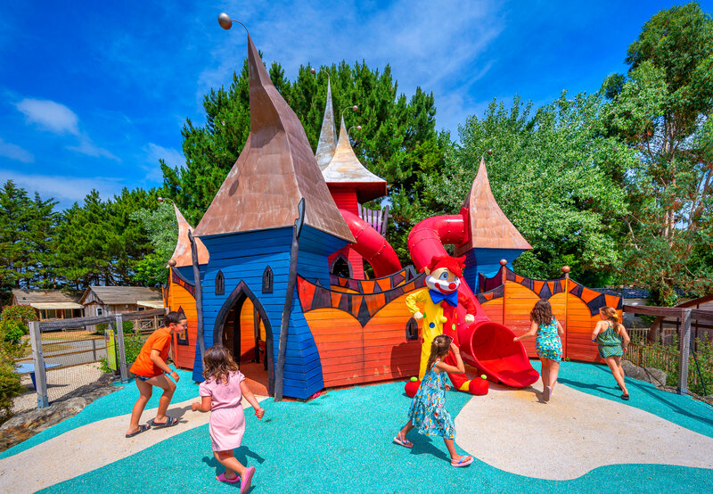 Carabouille playground - Colorful play castle with slides for children at CAPFUN An Trest campsite in SARZEAU (56).