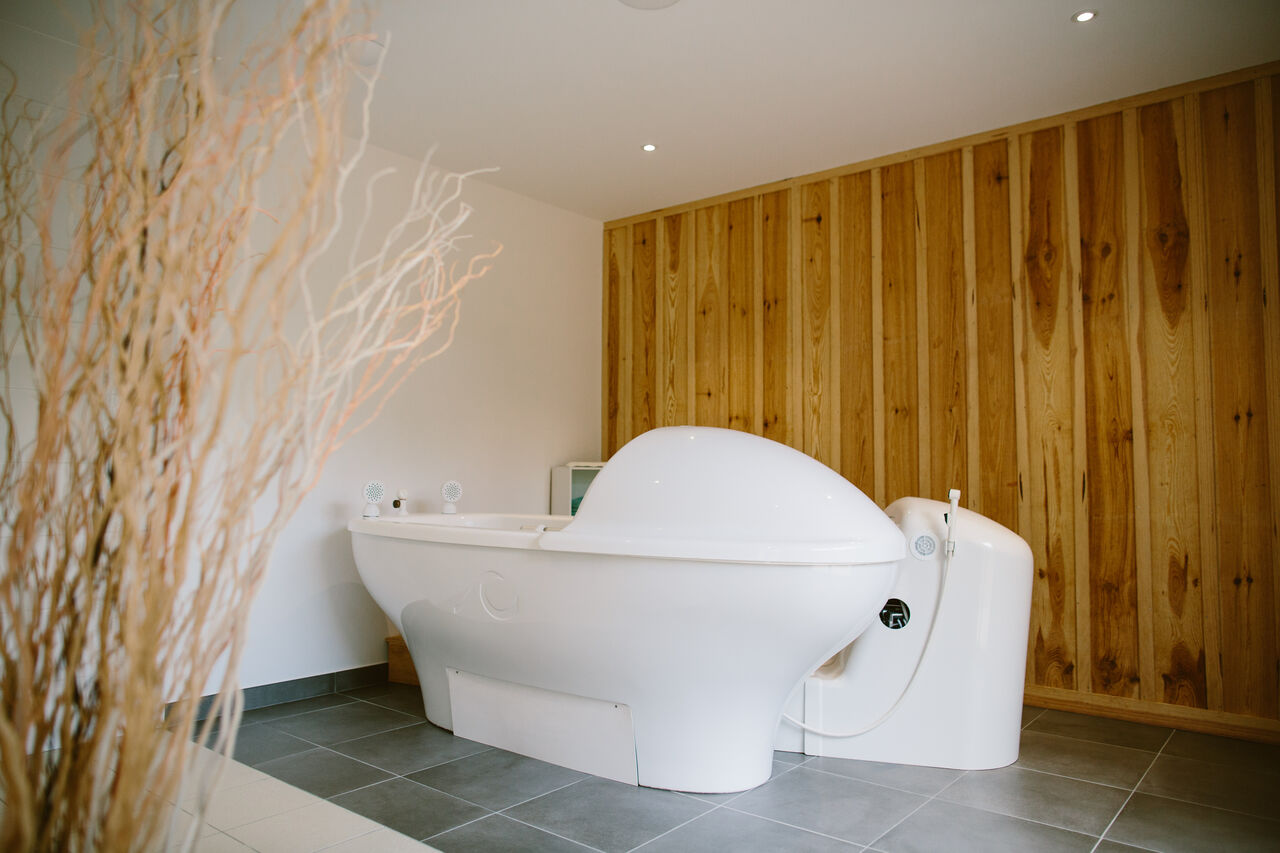 Modern floatation tank for relaxation at LIBRANOO Naturiste Arnaoutchot campsite in Veille-Saint-Girons, Landes, France.