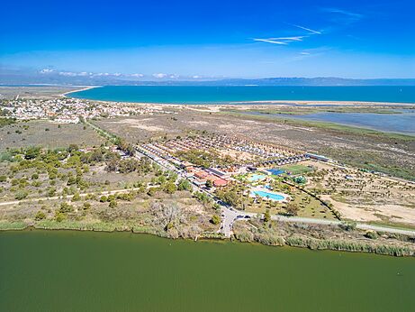 Aerial view of the campsite with swimming pools and Mobile homes at CAPFUN Aube in Deltebre, Tarragona.