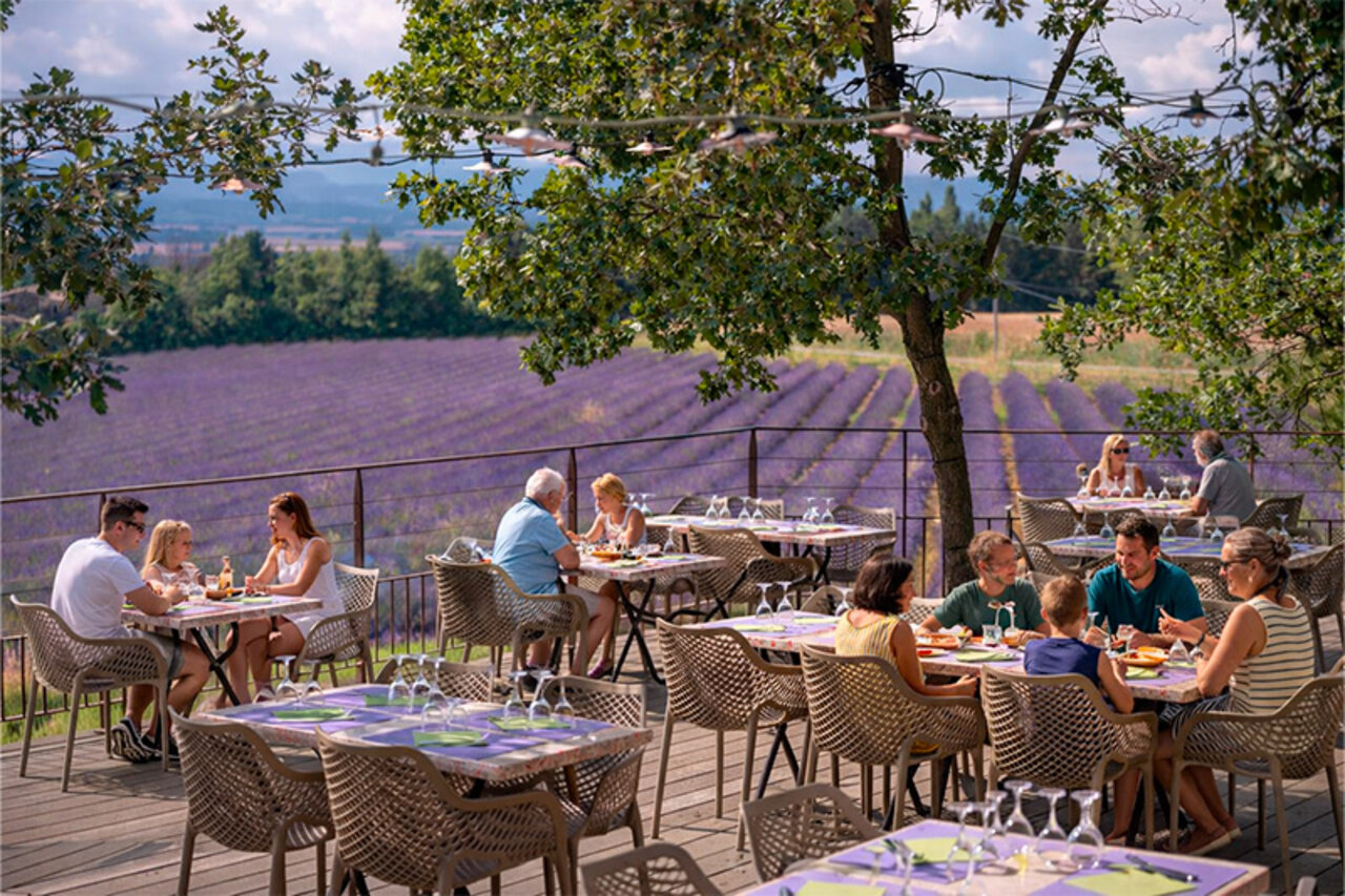 Outdoor restaurant terrace, lavender view, CLICOCHIC Bastets campsite Marsanne.