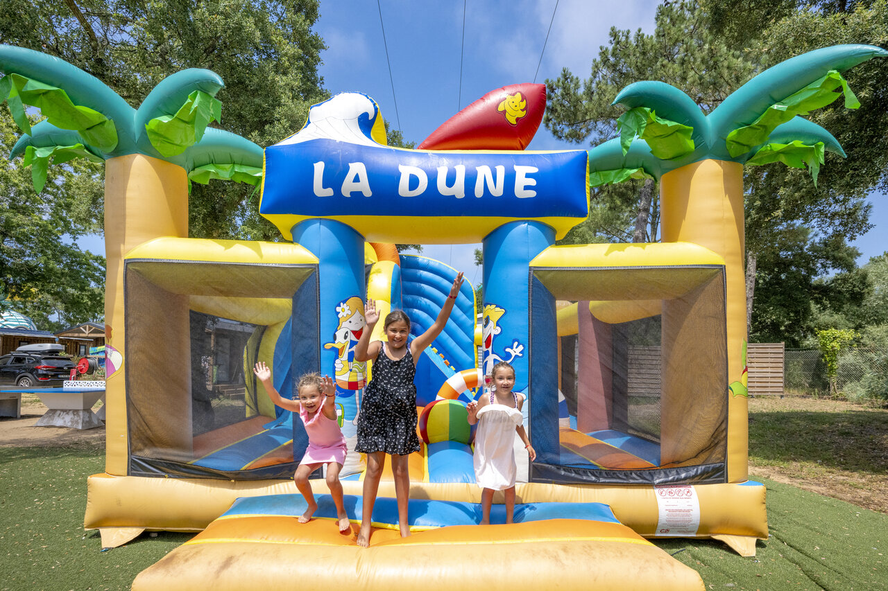 Inflatable bouncy castle La Dune, children, VAGUES OCEANES Boudigau campsite in LABENNE OCEAN.