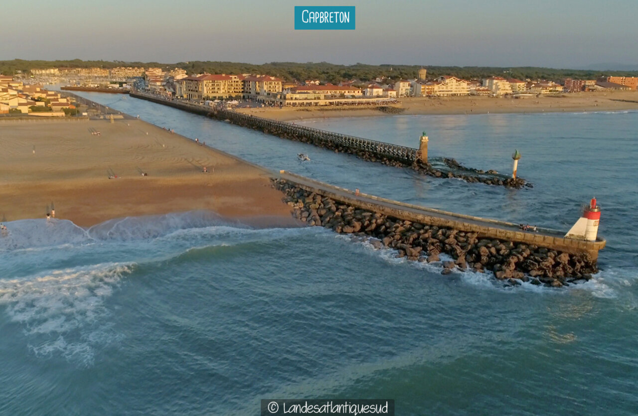 Capbreton harbor, beach and jetties with lighthouses, Landes.