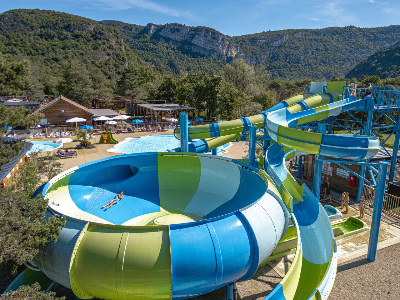Giant water slide and outdoor swimming pool at CLICOCHIC Chancia campsite in Chancia (01).