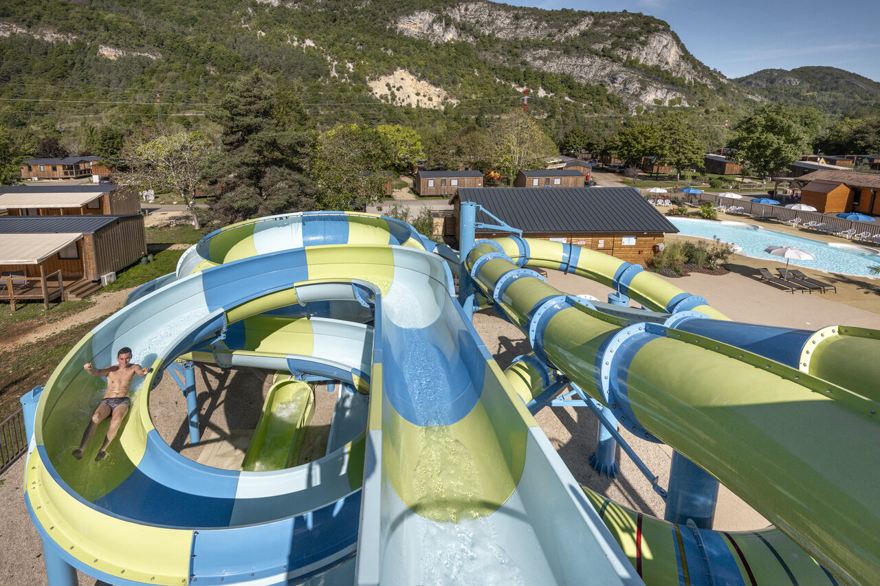 Giant water slide and outdoor swimming pool at CLICOCHIC Chancia campsite in Chancia (01).
