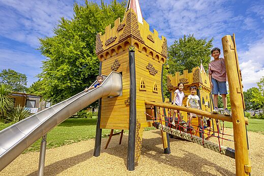 Castle playground, slide and children at CAPFUN Ch�teau de Galin�e campsite in SAINT CAST LE GUILDO (22).