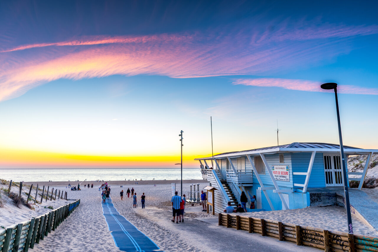 Lifeguard station on Moliets-Plage beach at sunset.