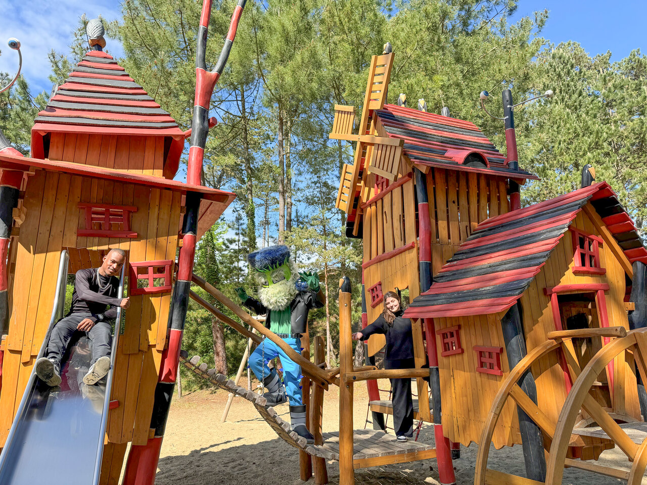 Slide, wooden playground, character at CAPFUN Dune Fleurie in Quend Plage.