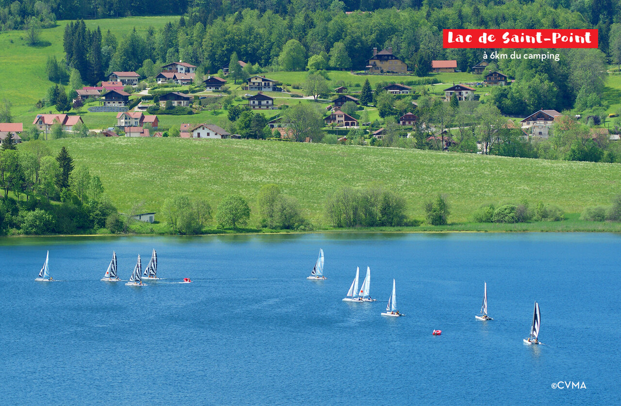 Sailboats on Lake Saint-Point, a water activity near Malbuisson, Jura.
