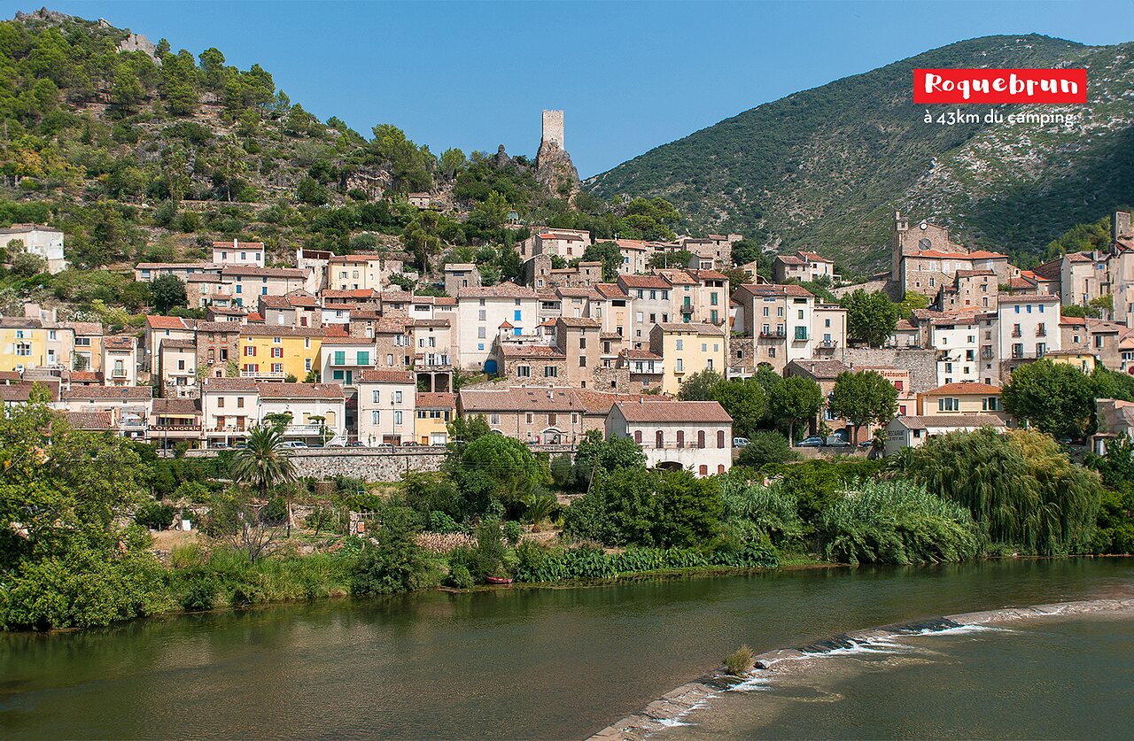 Medieval village of Roquebrun, H�rault, with its castle and river.