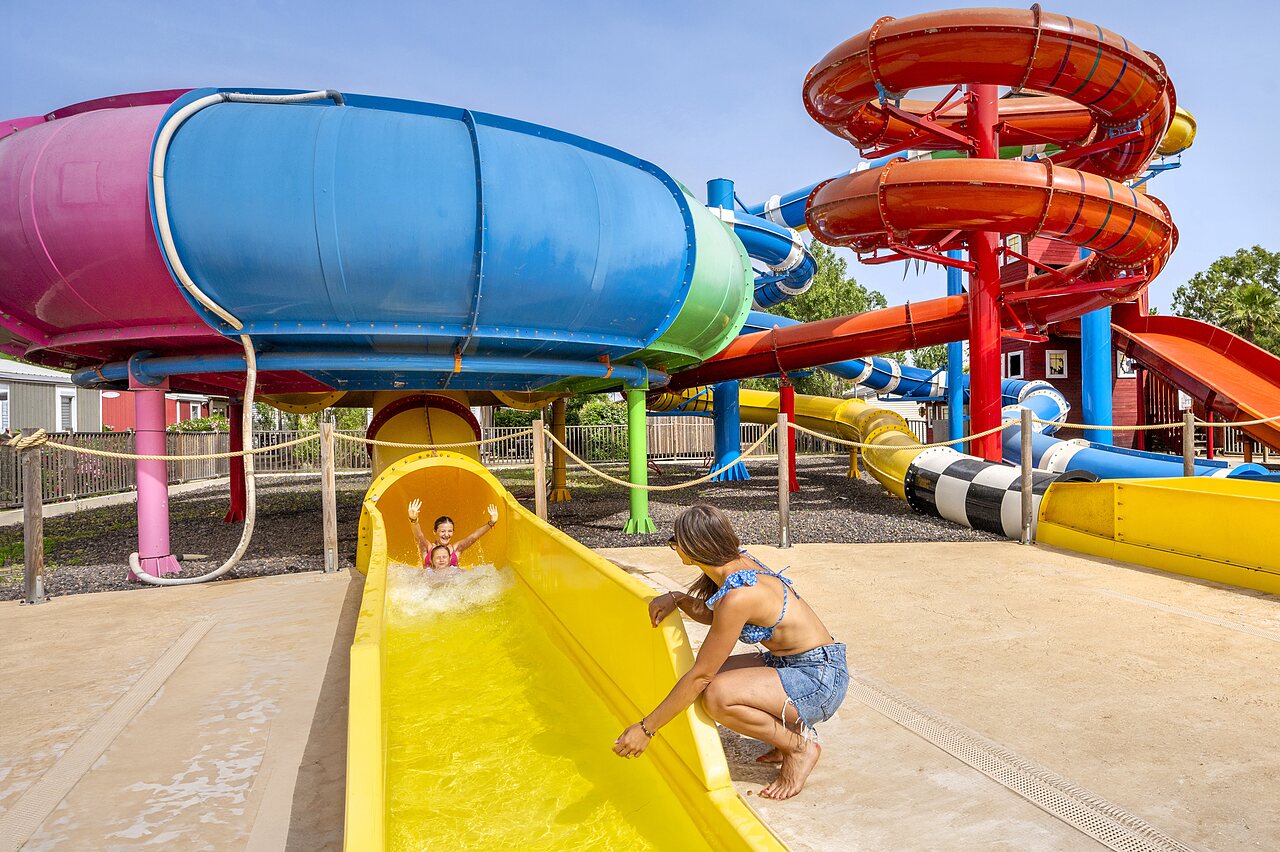 Colorful water slides, children having fun, CAPFUN Hermitage water park, SERIGNAN (34).