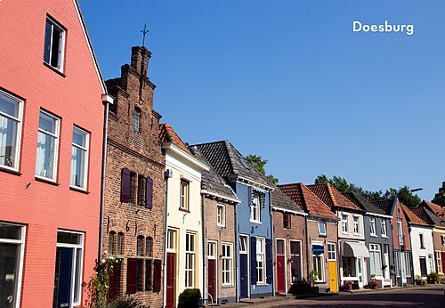 Traditional colorful houses along a historic street in Doesburg, Netherlands.