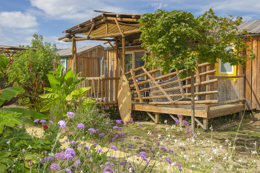 Holz-Mobil-home, Terrasse, Surfbrett am Camping CAPFUN Lila in LINXE (40).