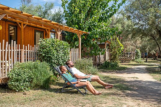 Holz-Mobilheim auf dem Campingplatz CAPFUN Lou Village in Vendres (34).