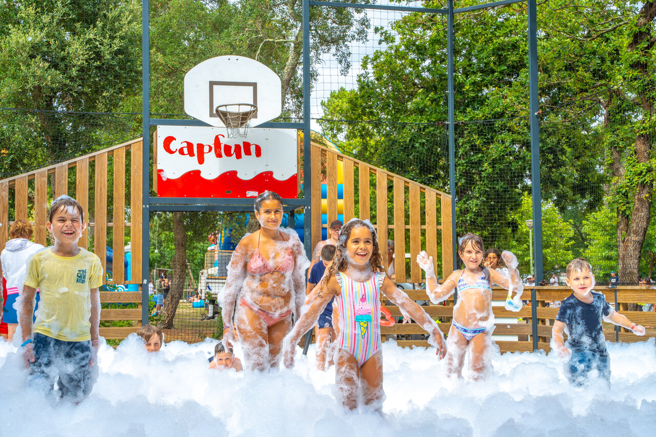 Kids enjoying foam party at CAPFUN Mer campsite in Labenne-Oc�an (40).