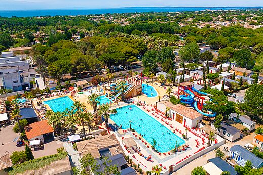 Swimming pools, giant water slides, aerial view camping CAPFUN Mer et Soleil Cap d'Agde.