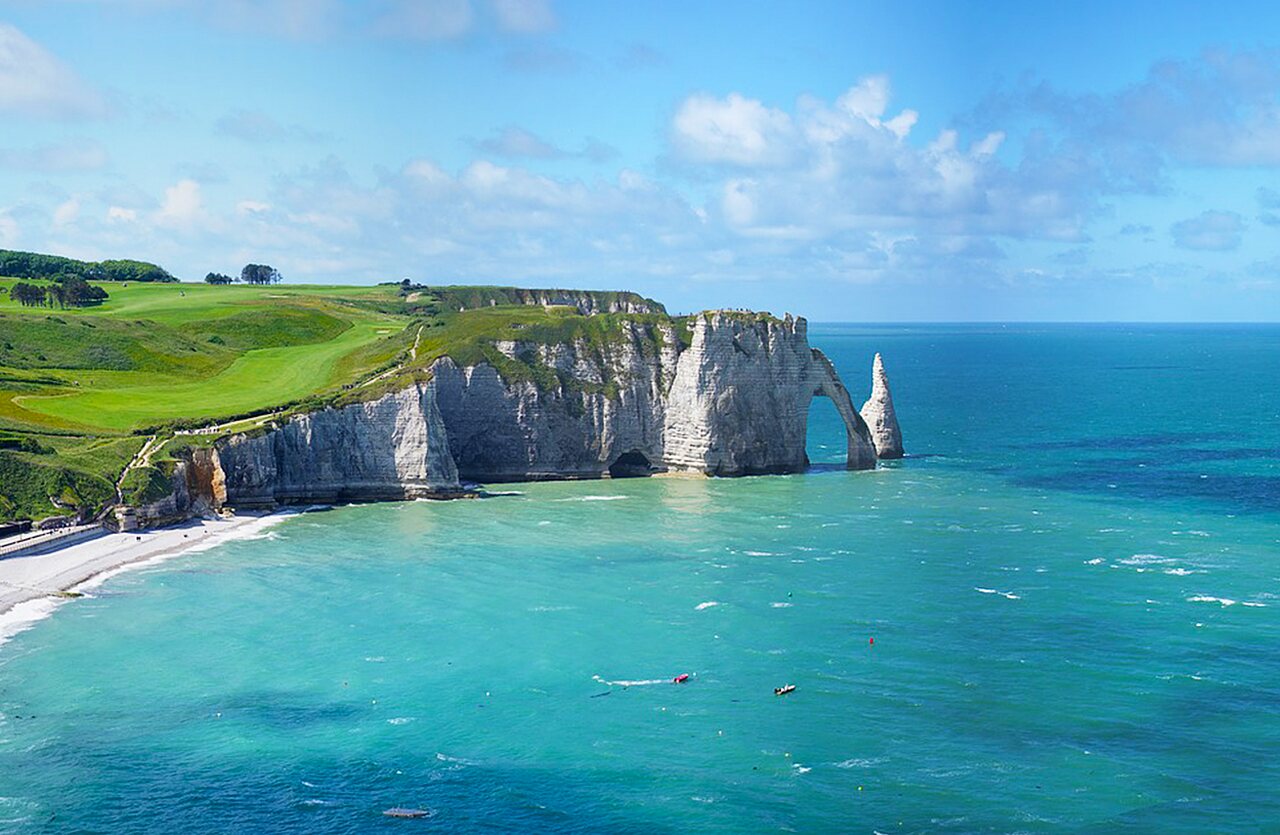 Cliffs of �tretat, natural arch and turquoise sea in Normandy.