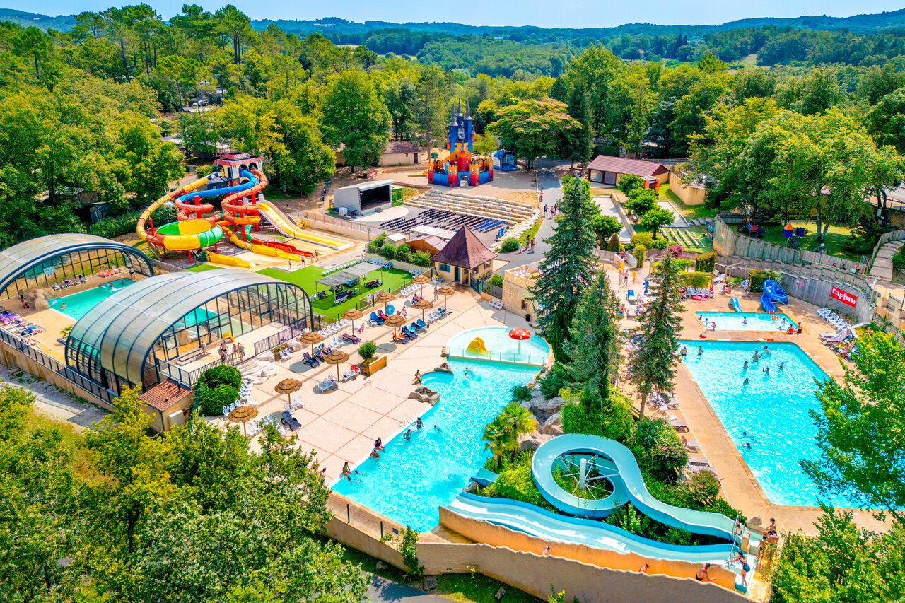 Water park with slides, outdoor and indoor pools at CAPFUN Palombi�re campsite in Sarlat.
