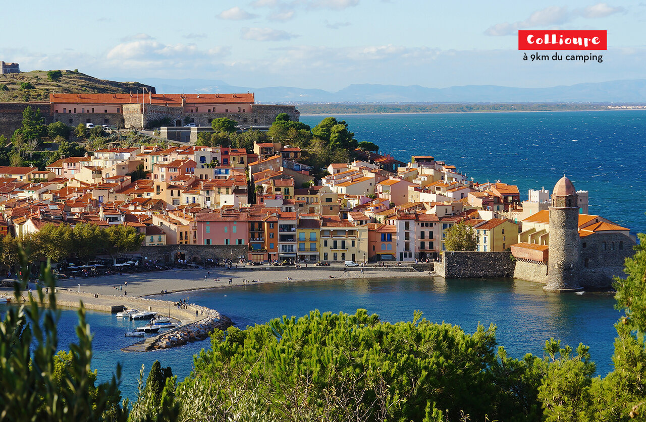 Collioure, charming coastal village with its bell tower and Mediterranean beach.