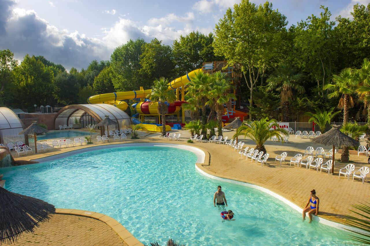 Outdoor pool, water slides at CAPFUN Paris Roussillon campsite in ARGELES SUR MER (66).