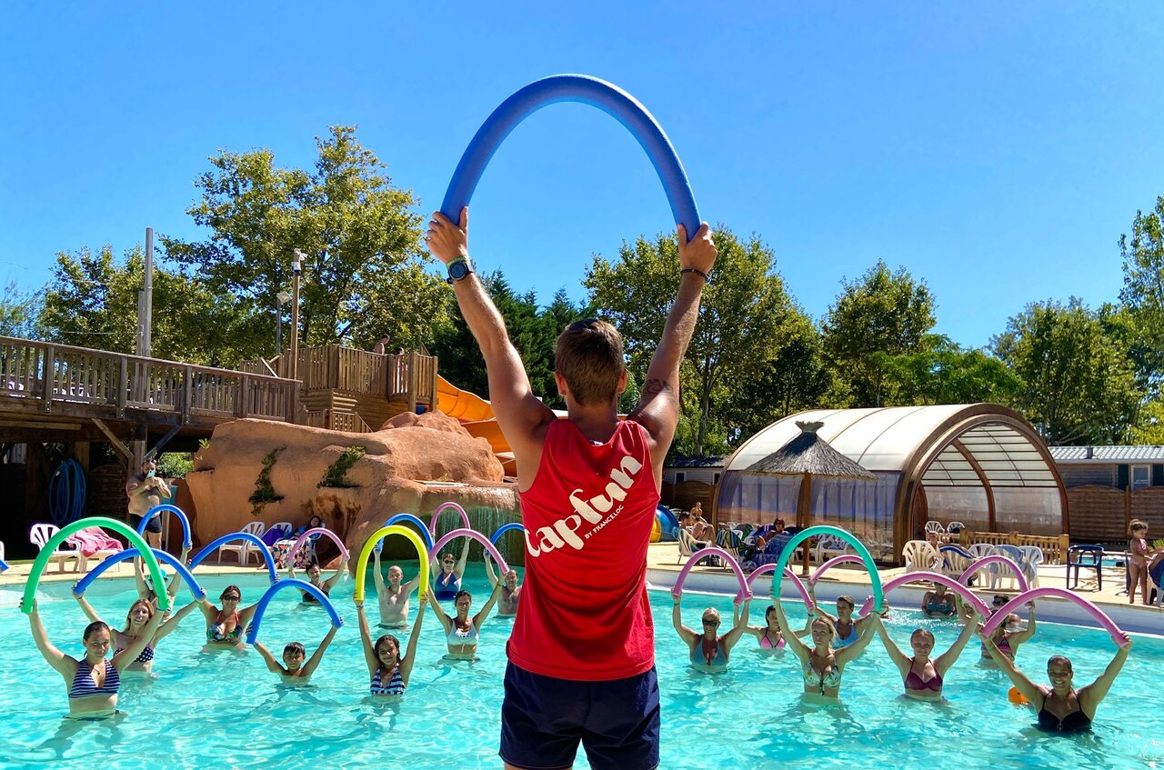 Aqua gym animation in outdoor pool at CAPFUN Paris Roussillon campsite, ARGELES SUR MER.