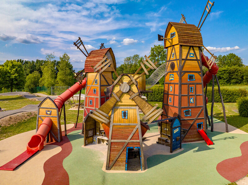 Carabouille playground - Giant windmill playground, slides, climbing nets, at CAPFUN Pergola campsite in Marigny (39).