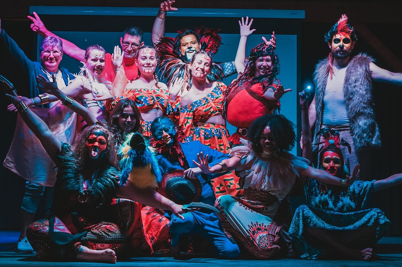 Costumed and made-up animators on stage at CAPFUN Ullule, Tournon d'Agenais.